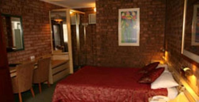 Countryman Motor Inn Даббо Номер фото